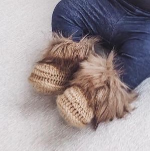 Faux fur crocheted baby booties in beige colour